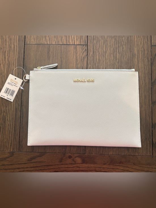 Michael Kors Handbags - Michael Kors Cream Saffiano Leather Wristlet with Gold Logo